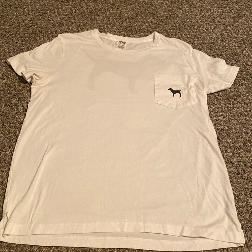White shirt with a black logo dog